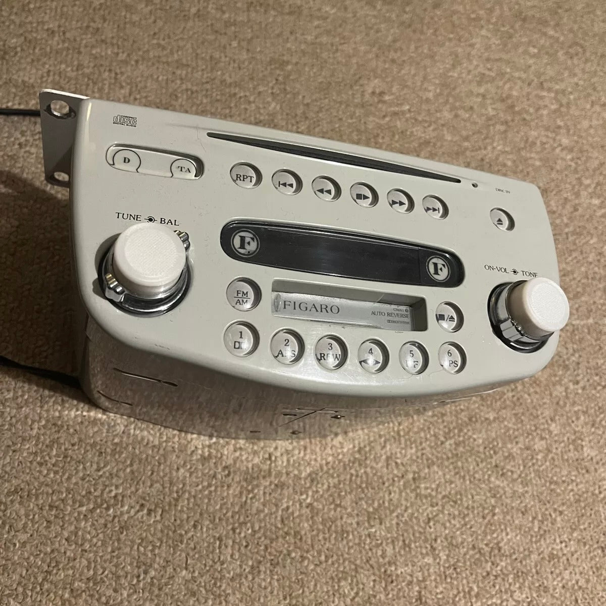 Nissan Figaro Clarion Stereo Knobs